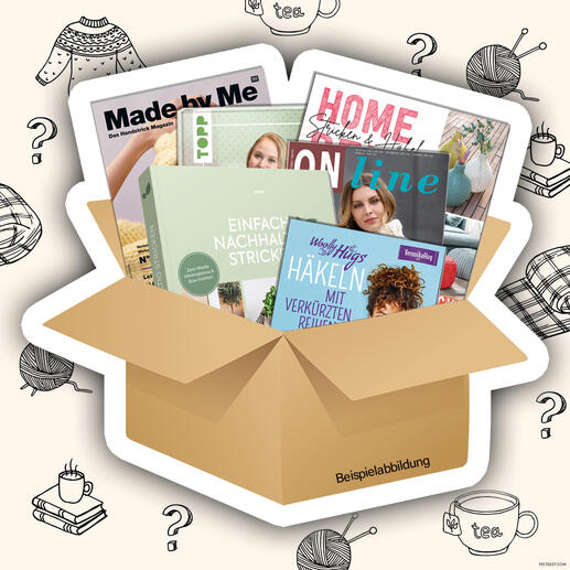 Mystery-Box mit Büchern, Anleitungen und Heften.