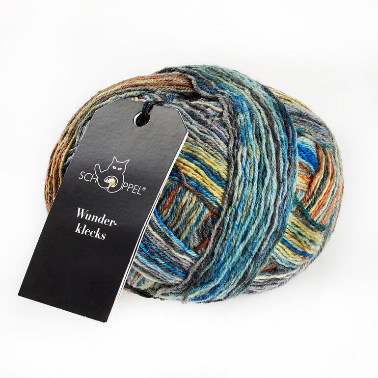 Sockenwolle Wunderklecks von Schoppel Wolle in vielfältigen Farben, in einem Knäuel.
