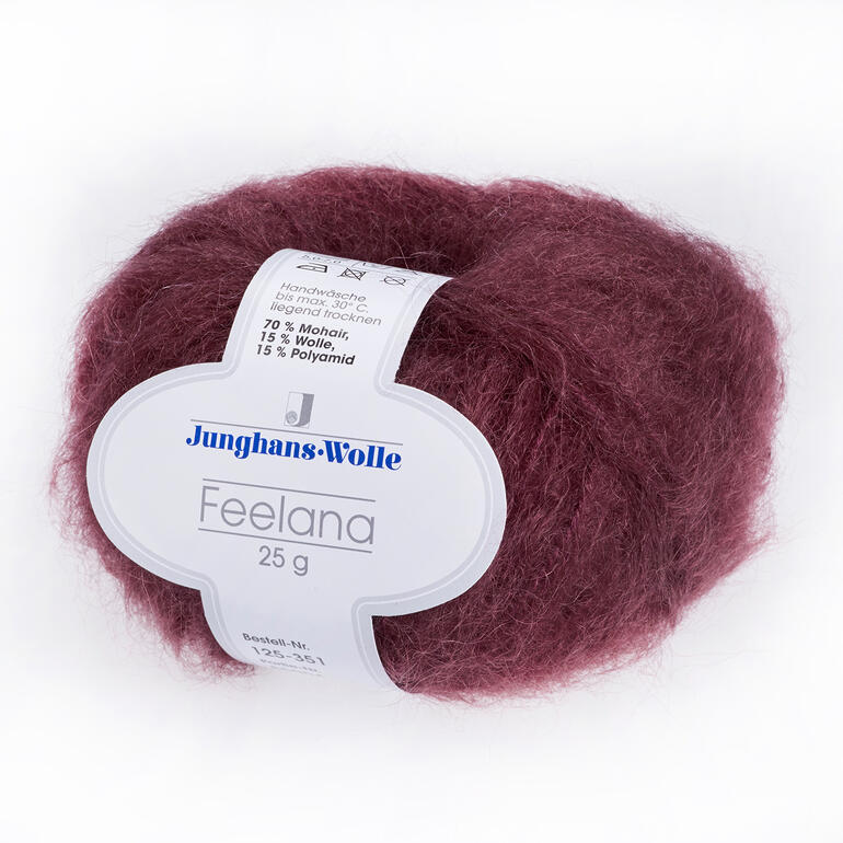 Wolle Feelana von Junghans-Wolle in dunklem Rot, voluminös und warm.