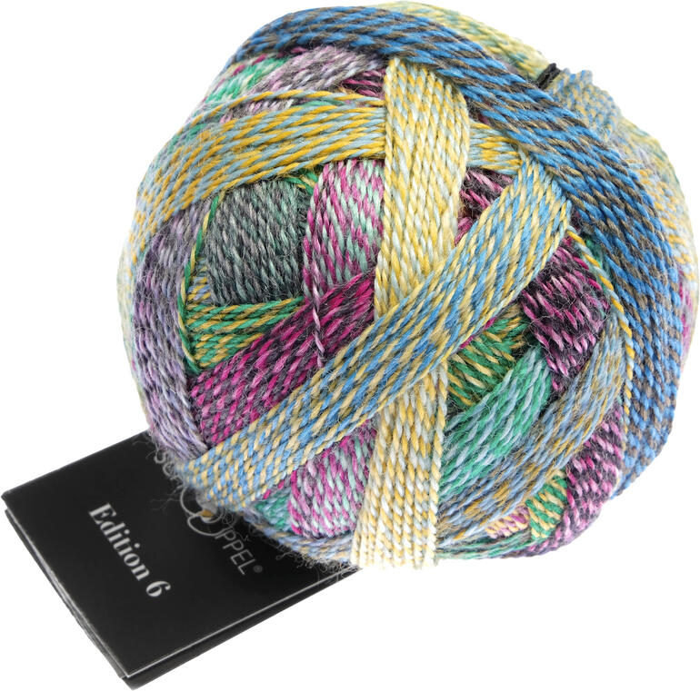 Wollknäuel 'Edition 6' in bunten, komplexen Farben, schön gewickelt.