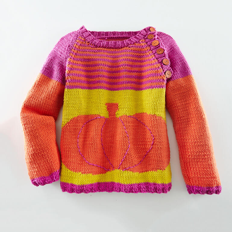 Anleitung 804/4: Raglan-Kinderpullover mit orange-rotem Kürbis-Muster.