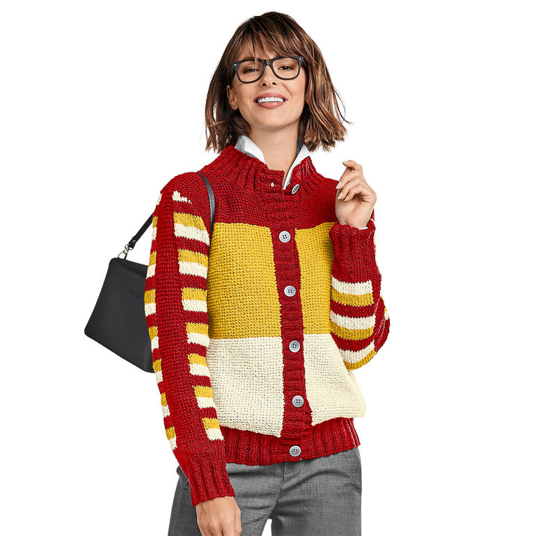 Frau in gestreifter Damenjacke, farbenfroh mit einem kleinen Handtasche.