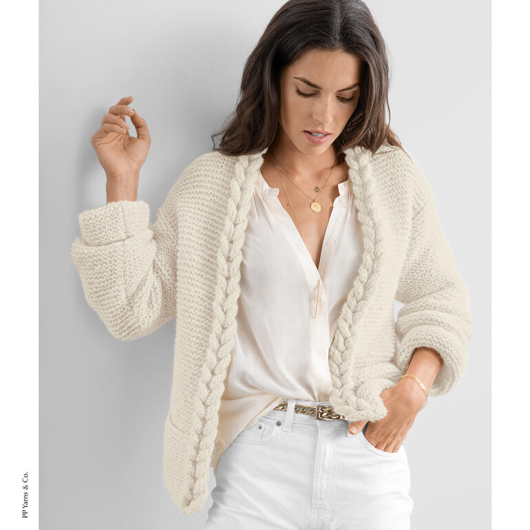 Jacke aus Phil Air Pérou in Cremefarbe mit ausgefallenem Strickmuster.