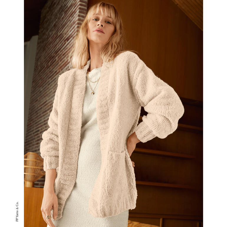 Beige Jacke aus Phil Chouchou, getragen von einer Frau.