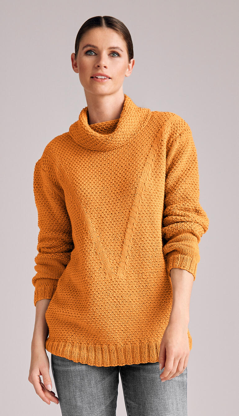 Orange Pullover aus Merino-Cotton mit hohem Kragen und grober Strickoptik.