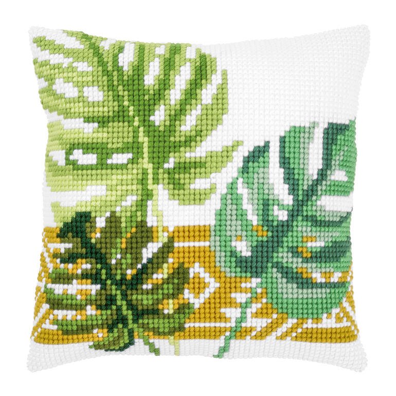 Kreuzstichkissen mit botanischen Blättern in Grün und Gelb.