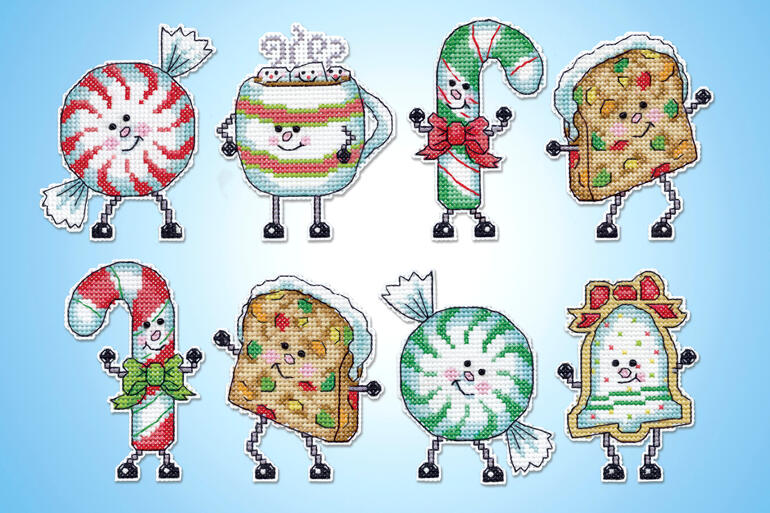 Set von 8 bunten Anhängern in Form von Süßigkeiten und Weihnachtsfiguren.